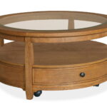 Durant - Round Cocktail Table With Casters - Honey Brown