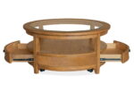Durant - Round Cocktail Table With Casters - Honey Brown - Image 2